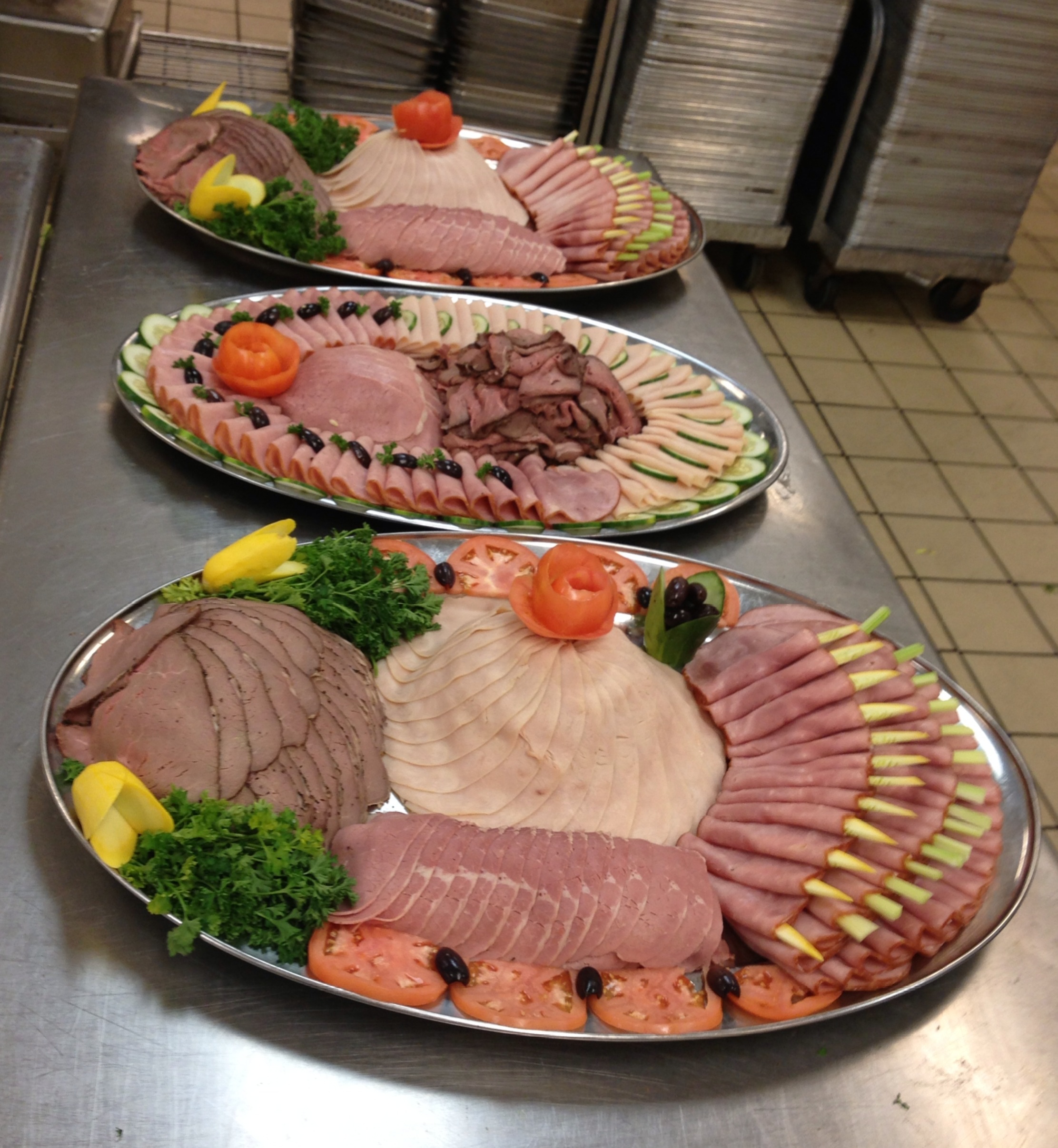 Deli art garnished with garden vegetables